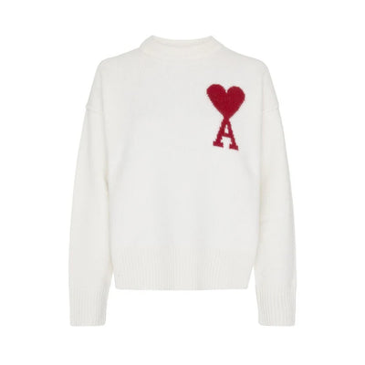 Experience Parisian elegance with the Ami Paris Sweater in white, featuring a red A heart on the left chest. Designed with ribbed cuffs, hem, and a round neckline for ultimate comfort and style.